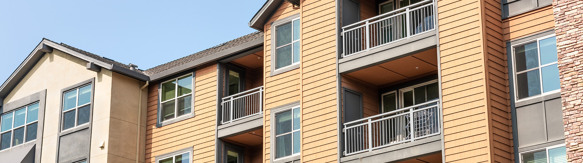 Commercial apartment building with newly installed siding