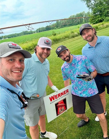 Group photo of Werner Cares volunteers at a local community event