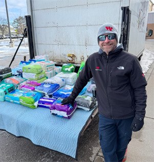 Werner Roofing team members assisting with a charitable project in Michigan