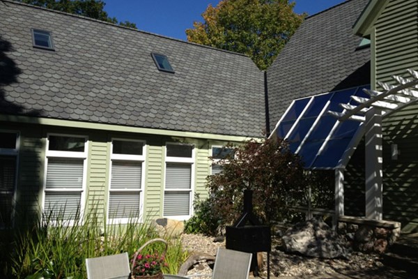 Small skylights are shown on the roof of a home in Michigan