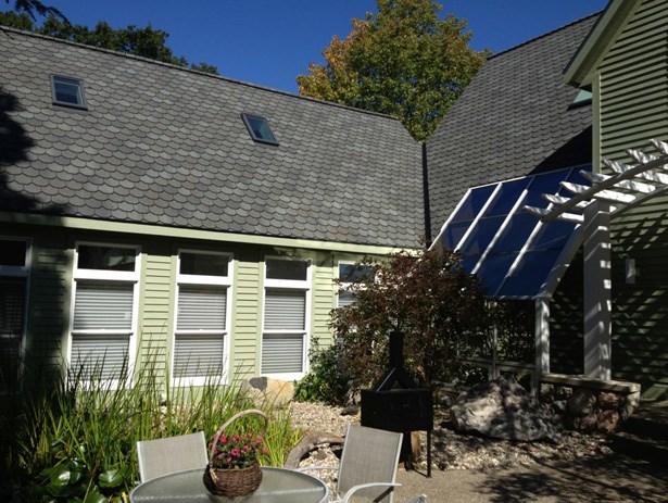 Small skylights are shown on the roof of a home in Michigan