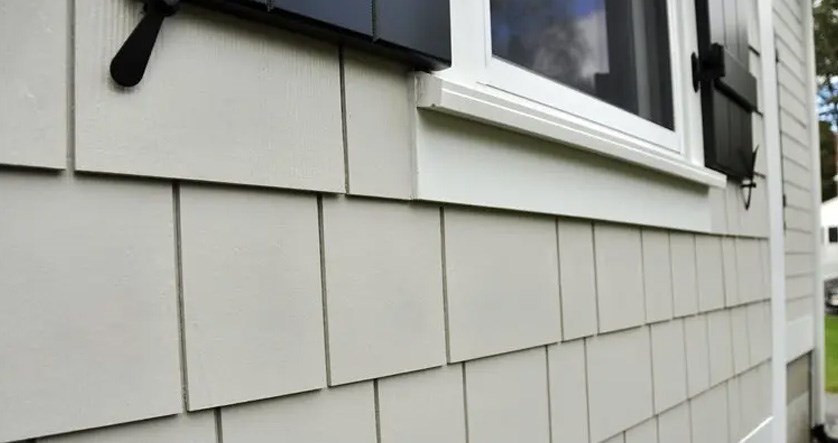 Close up view of fiber cement siding from our siding experts in Michigan