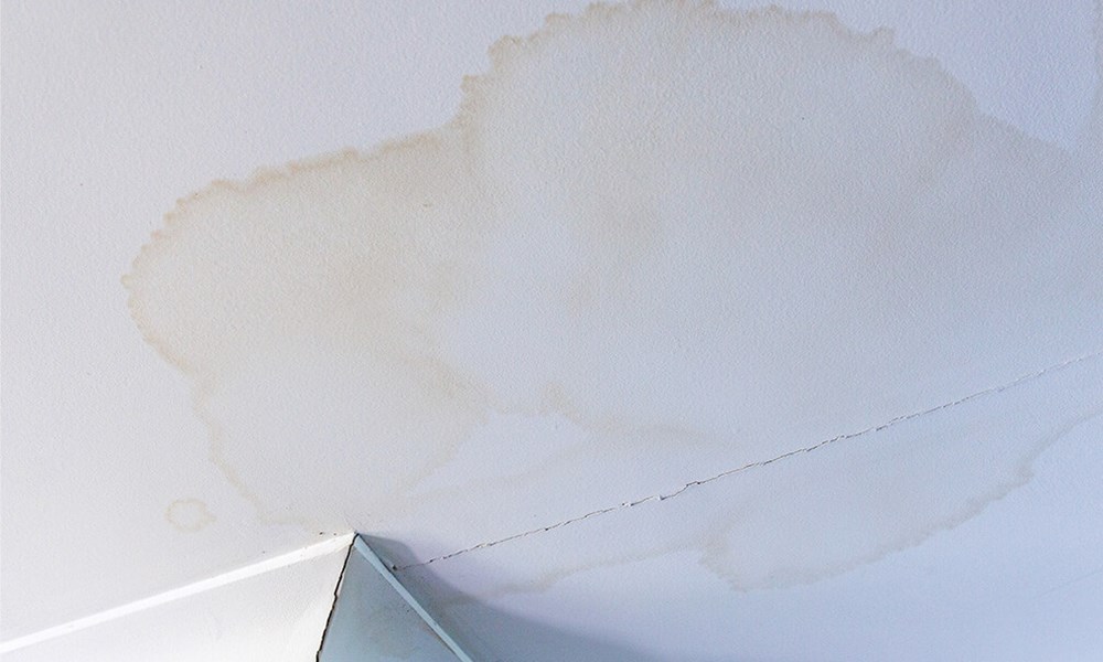 Discolored ceiling showing a sign that the roof needs to be repaired