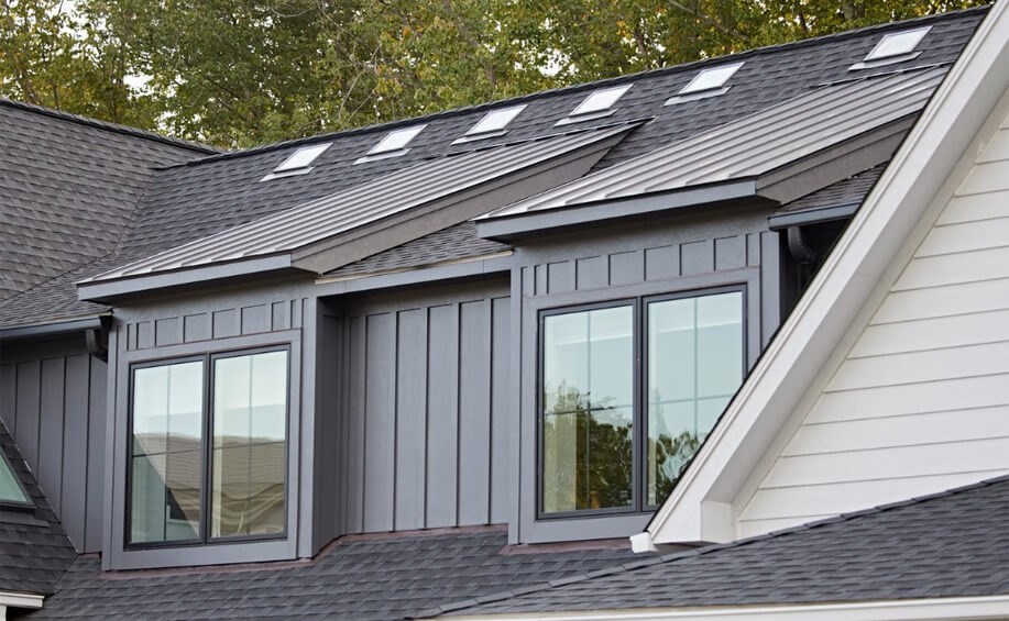 Exterior of Michigan home shown with skylights