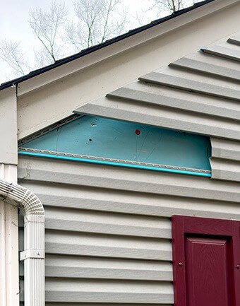 inspecting loose siding