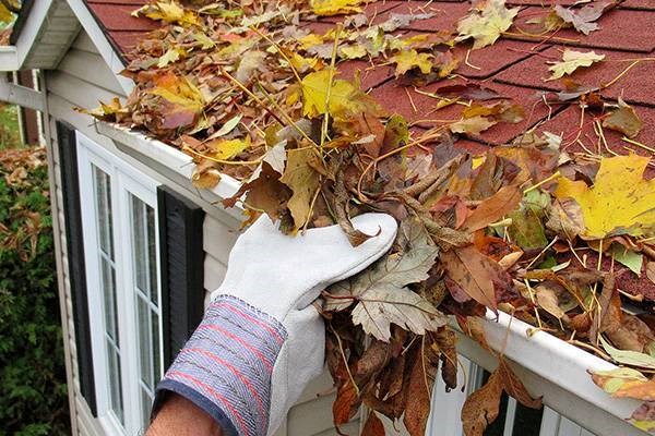 Cleaning debris from gutters