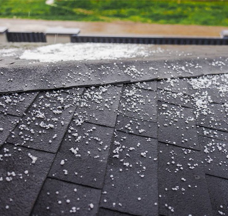 Hail damage to roofing shingles