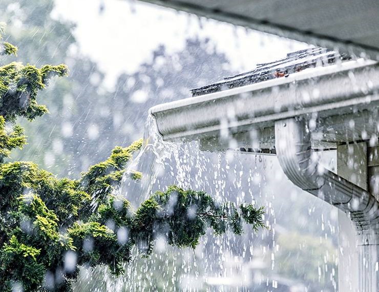 Heavy rainfall impacting residential roof